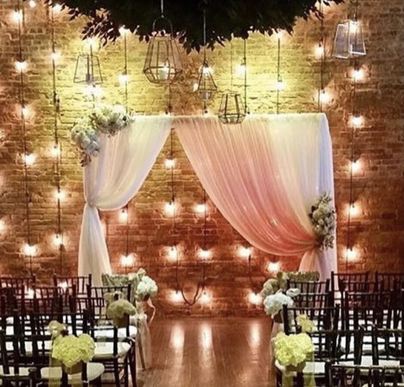 pipe and drape style wedding ceremony arch