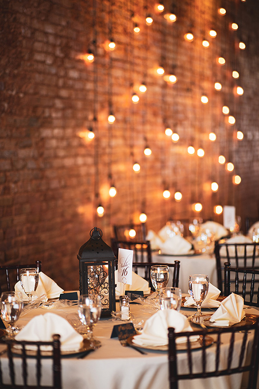 wedding set up with string lights in the backgraound