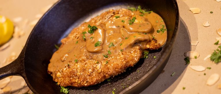 Almond crusted chicken made with brandy cream sauce
