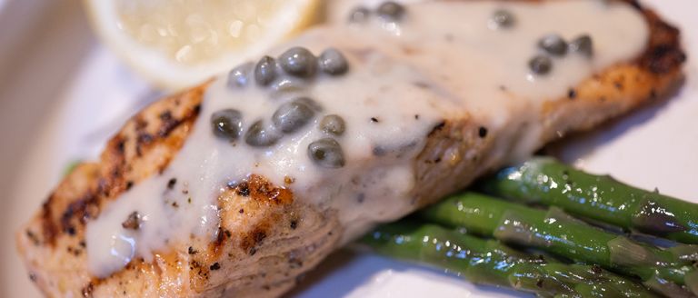 salmon with picatta sauace made with lemon butter wine sauce
